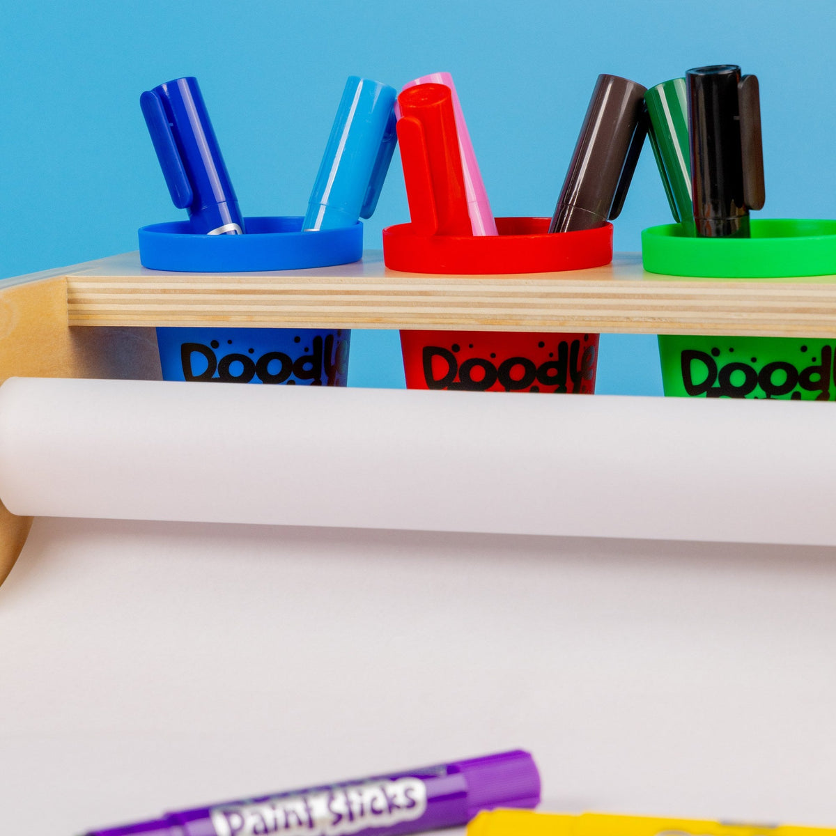 Close-up of the four colour-coded organizer cups on the Art Station
